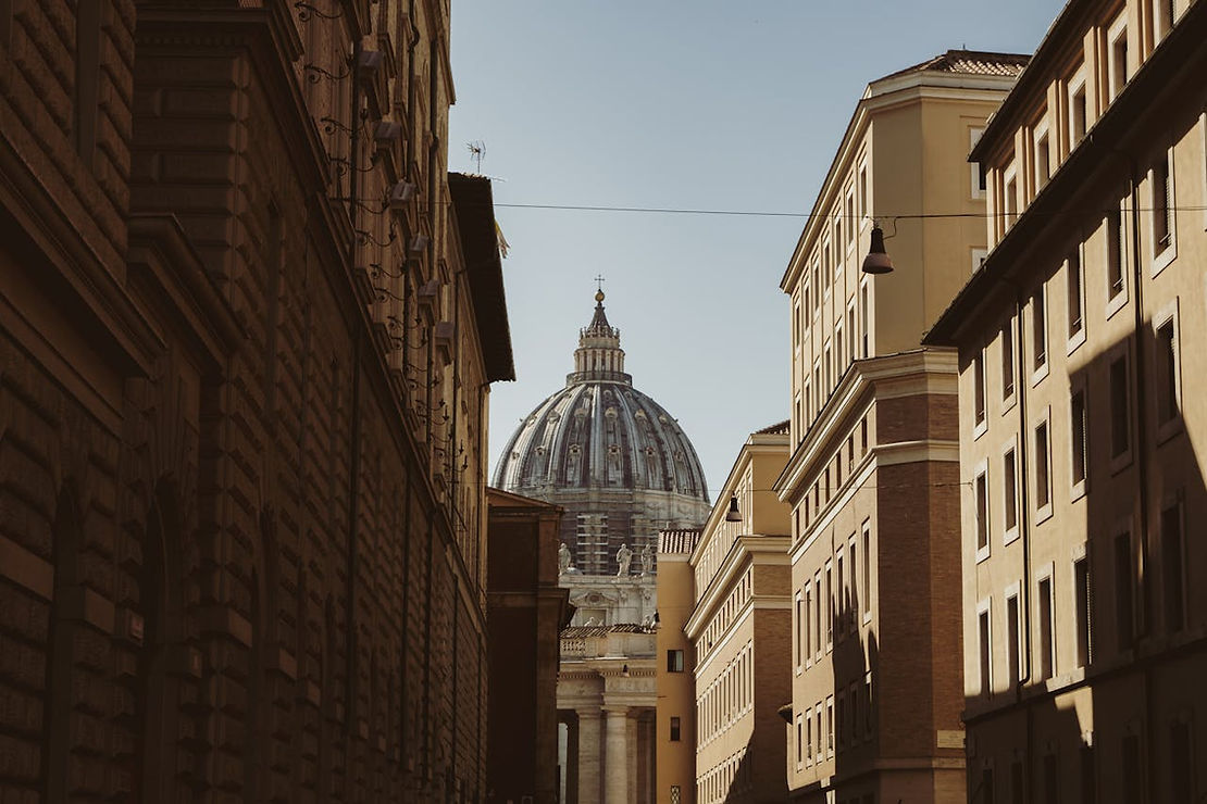 St Peter's Basilica peeping through the buildings of Rome