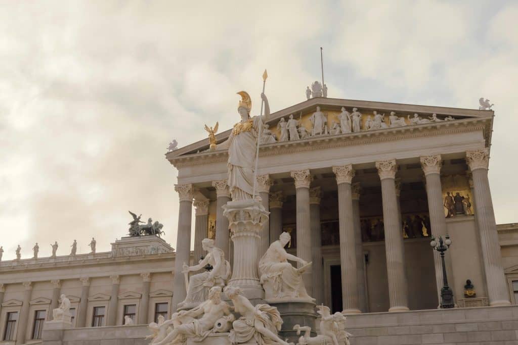 Pallas Athene Fountain and Parliament Building in Vienna, Austria