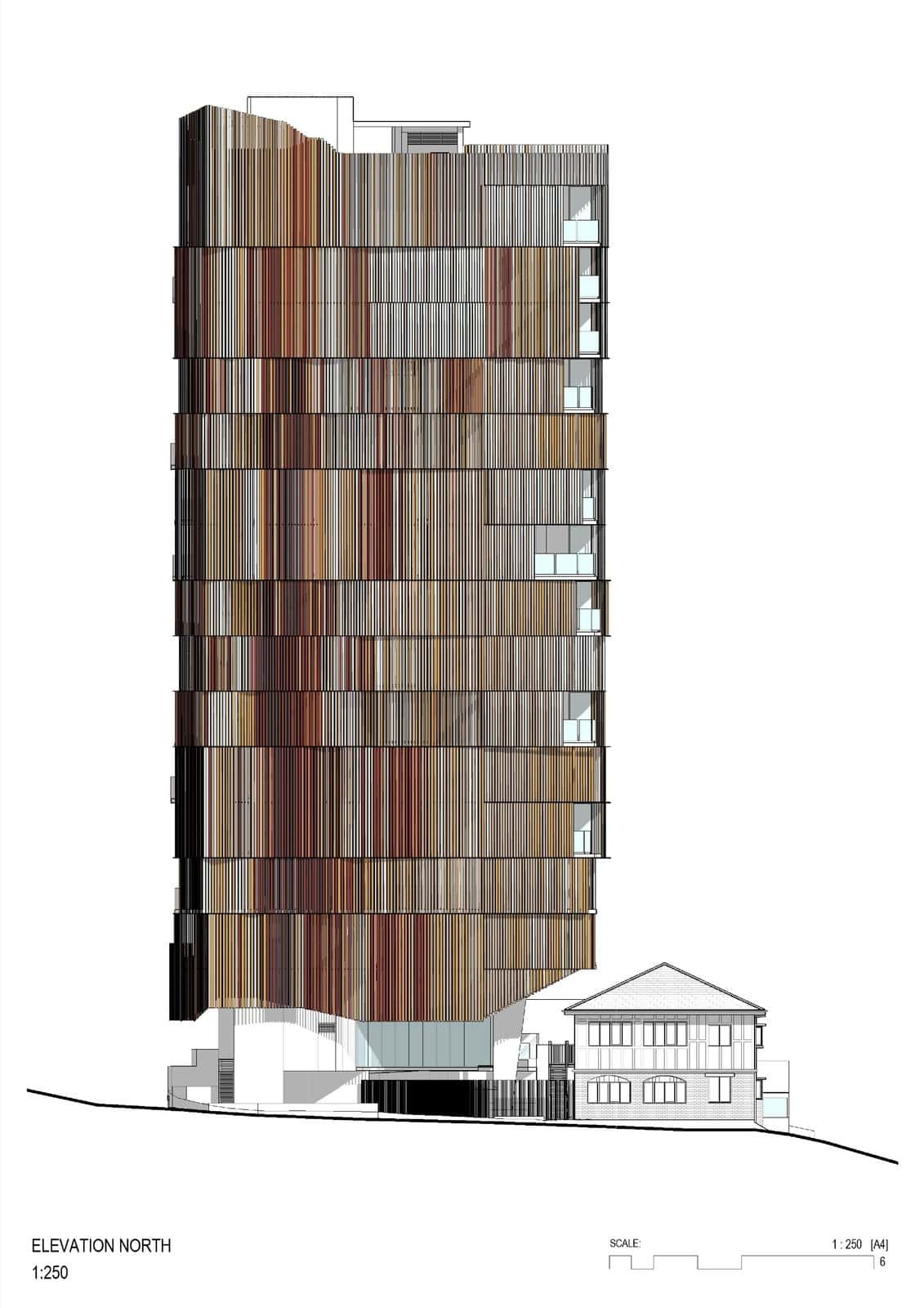 Material and texture north elevation of Walan by bureau^proberts, a 14-storey Brisbane tower wrapped in red, brown and ochre vertical screens beside a heritage house