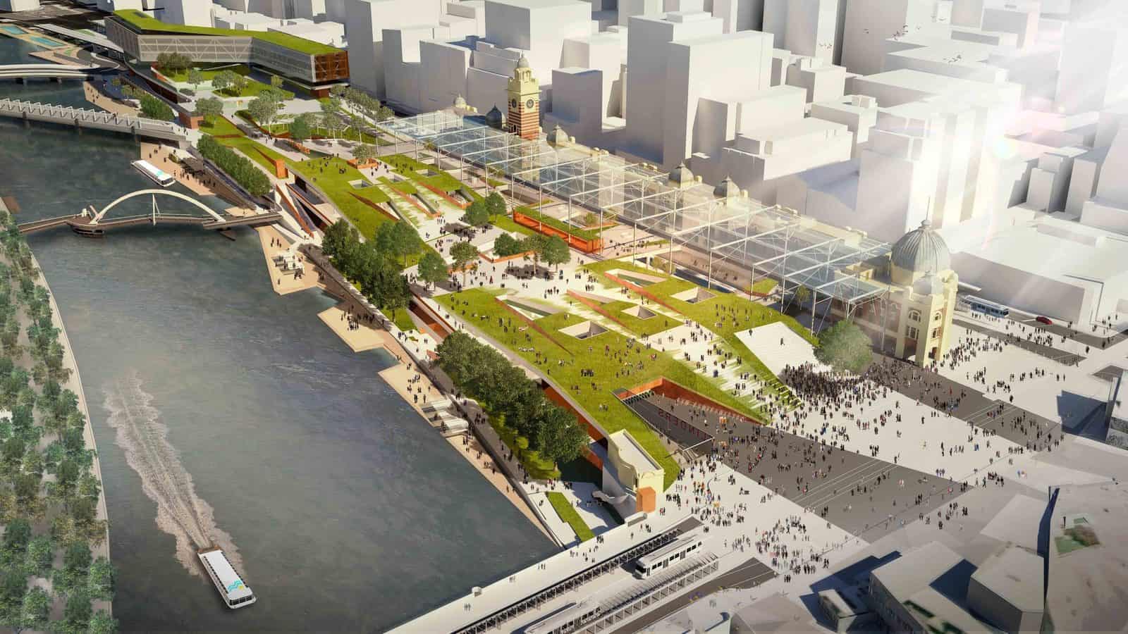 Aerial render of a Flinders Street Station competition entry in Melbourne by Eduardo Velasquez, Manuel Pineda and Santiago Medina, a long green roof over the rail yards beside the Yarra River and city towers